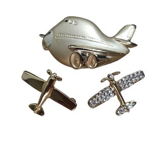 Three airplanes brooches